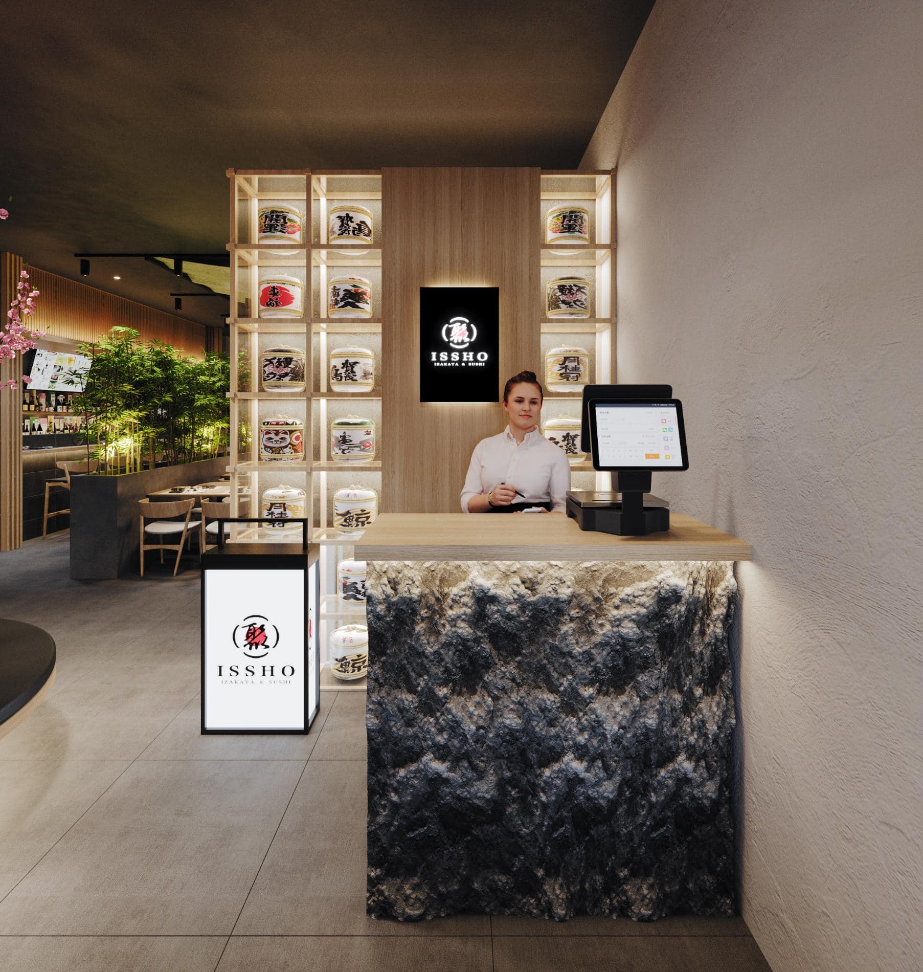 A restaurant with a counter and a person at the counter